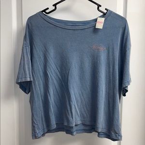 Blue cropped VS Pink shirt